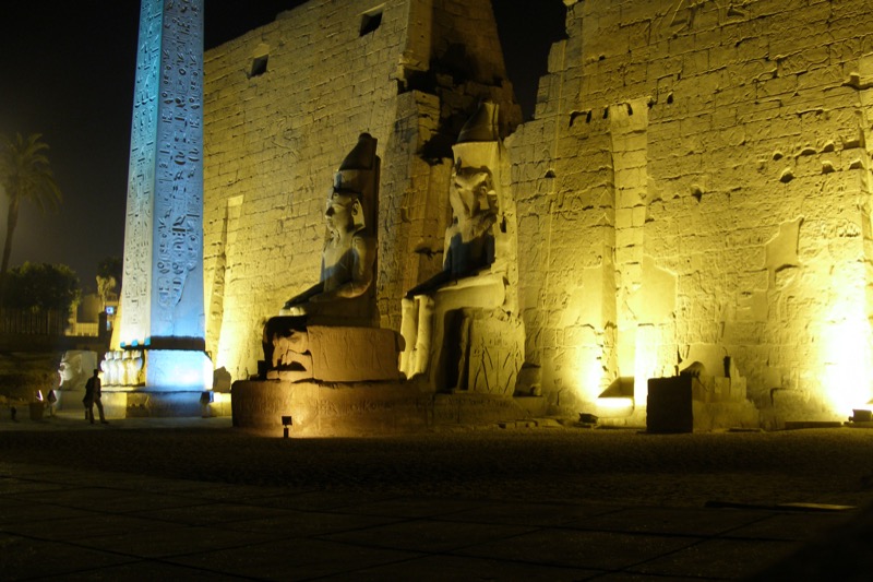 Luxor Temple illuminated at night along the Nile corniche
